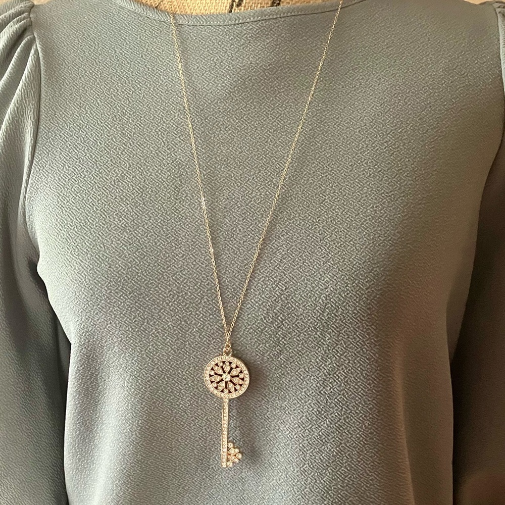 Gold crystal key pendant necklace